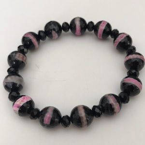 Hand Crafted Bracelet with Faceted Black Onyx Beads with Pink Highlights